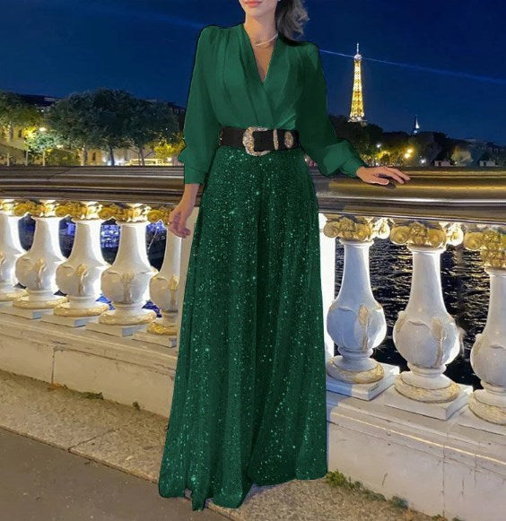 Elegantna bluza z dolgimi rokavi in V-izrezom ter široke hlače z bleščicami