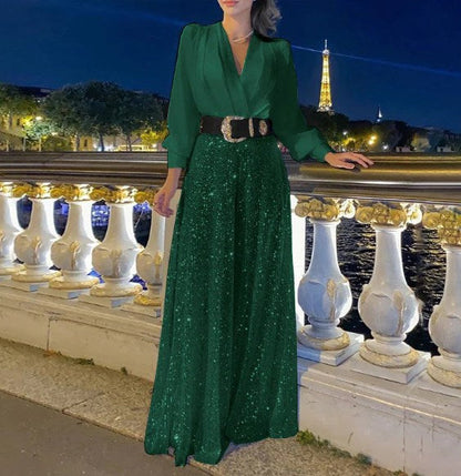 Elegantna bluza z dolgimi rokavi in V-izrezom ter široke hlače z bleščicami